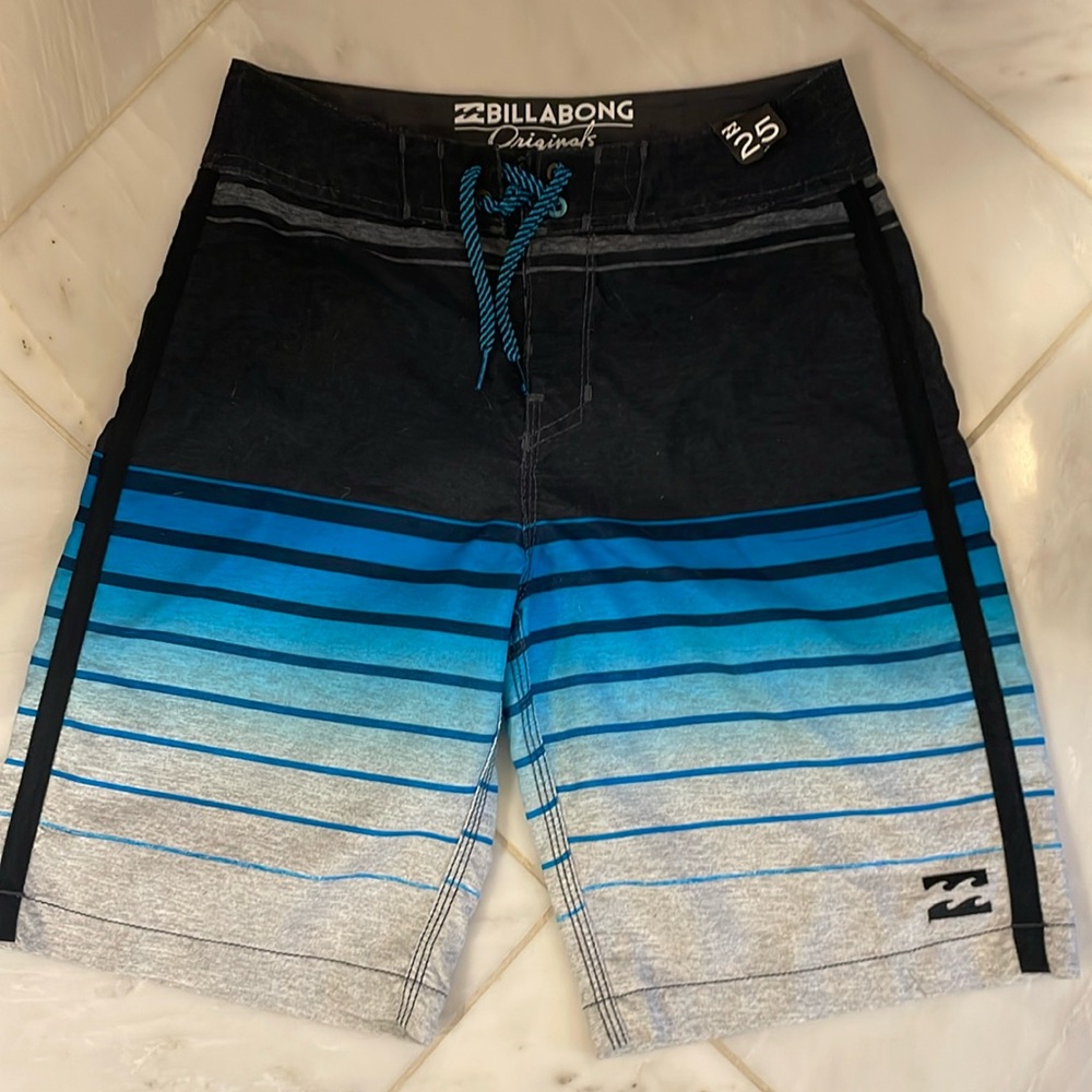 Billabong swim trunks size 25 blue, gray and black
